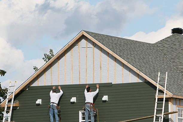 Professional Siding Installation technician working in College Corner, OH